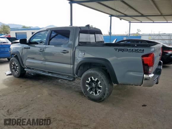2019 Toyota Tacoma SR with VIN 3TMCZ5ANXKM271710, listed as a Copart auction lot 80954785 with 113,567 mi miles and Salvage title. Bid and sale history available at DreamBid. Image 2.