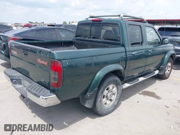 2000 Nissan Frontier XE with VIN 1N6ED27T1YC392998, listed as a IAAI auction lot 43030074 with 195,913 mi miles and . Bid and sale history available at DreamBid. Image 4.