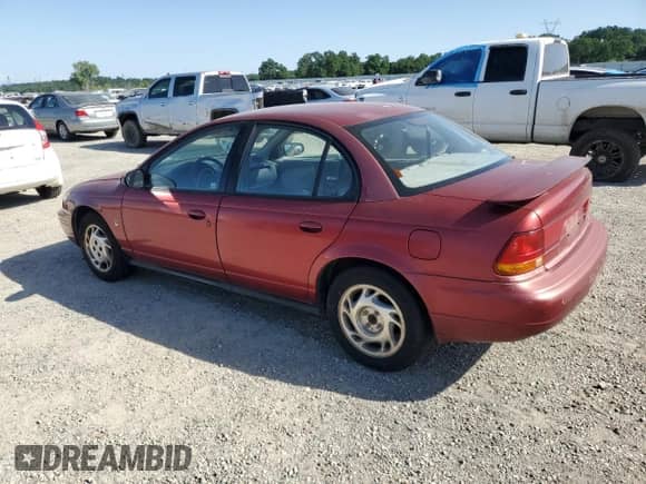 1996 Saturn SL with VIN 1G8ZK5278TZ334649, listed as a Copart auction lot 54098725 with 156,012 mi miles and Salvage title. Bid and sale history available at DreamBid. Image 2.
