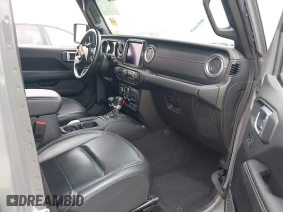 2022 Jeep Wrangler Unlimited Sahara with VIN 1C4HJXEG8NW105243, listed as a IAAI auction lot 42031040 with 38,418 mi miles and . Bid and sale history available at DreamBid. Image 5.