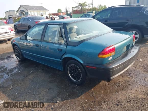 1995 Saturn SL with VIN 1G8ZH5287SZ132326, listed as a IAAI auction lot 42403334 with 122,285 mi miles and . Bid and sale history available at DreamBid. Image 3.