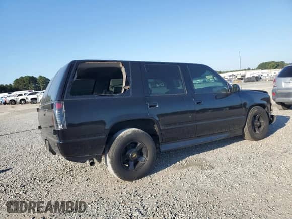 2000 Chevrolet Tahoe Limited с VIN 1GNEC13R0YR160441, выставлен на аукционе Copart как лот 71398315 с пробегом 212 698 миль миль и Списание • Salvage title. История ставок и продаж доступна на DreamBid. Изображение 3.