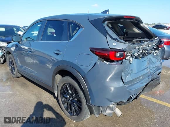 2023 Mazda CX-5 S Preferred z VIN JM3KFBCM3P0164913, wystawiony jako IAAI lot #43090454 z przebiegiem 48 866 mil mil oraz . Historia ofert i sprzedaży dostępna na DreamBid. Obrazek 3.