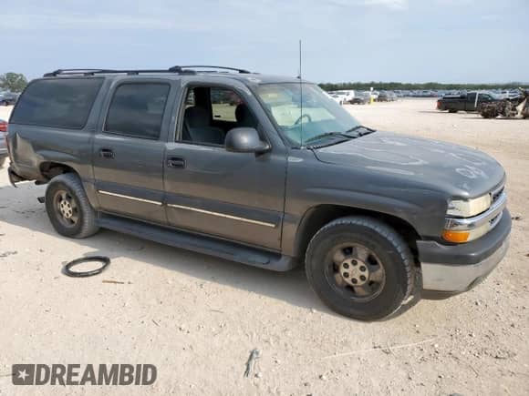 2002 Chevrolet Suburban LT с VIN 1GNEC16Z52J125301, выставлен на аукционе Copart как лот 69219085 с пробегом 272 829 миль миль и Списание • Salvage title. История ставок и продаж доступна на DreamBid. Изображение 4.