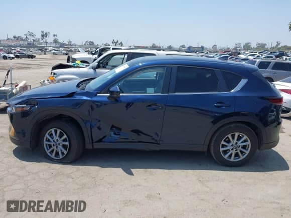 2023 Mazda CX-5 S Preferred z VIN JM3KFBCM4P0257505, wystawiony jako IAAI lot #42595704 z przebiegiem Nie podano mil oraz . Historia ofert i sprzedaży dostępna na DreamBid. Obrazek 13.