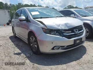 2014 Honda Odyssey Touring with VIN 5FNRL5H91EB093585, listed as a IAAI auction lot 42541239 with 186,793 mi miles and . Bid and sale history available at DreamBid. Image 1.