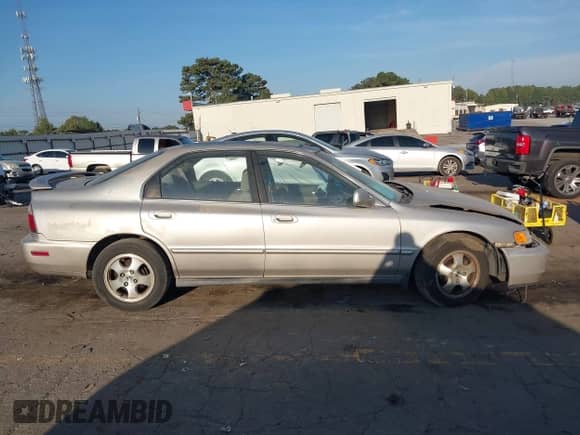 1997 Honda Accord Special Edition with VIN 1HGCD5604VA125673, listed as a IAAI auction lot 43289440 with 243,649 mi miles and . Bid and sale history available at DreamBid. Image 13.