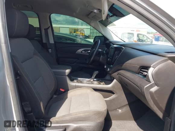 2019 Chevrolet Traverse LS z VIN 1GNERFKW7KJ186981, wystawiony jako IAAI lot #43303144 z przebiegiem 130 898 mil mil oraz . Historia ofert i sprzedaży dostępna na DreamBid. Obrazek 5.