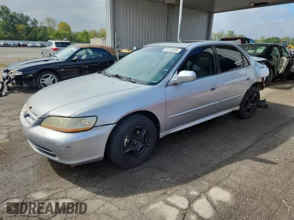 2002 Honda Accord EX with VIN 1HGCG55622A014483, listed as a Copart auction lot 81110335 with 305,384 mi miles and Salvage title. Bid and sale history available at DreamBid. Image 1.