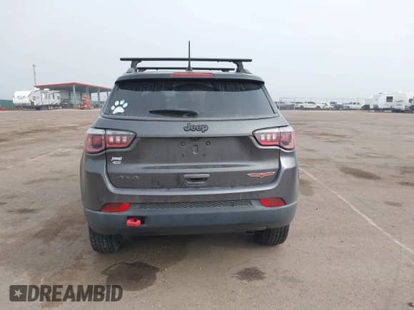 2019 Jeep Compass Trailhawk z VIN 3C4NJDDB9KT697776, wystawiony jako IAAI lot #43195312 z przebiegiem 82 655 mil mil oraz . Historia ofert i sprzedaży dostępna na DreamBid. Obrazek 17.