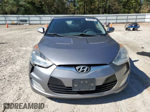 2013 Hyundai Veloster w/Black Int z VIN KMHTC6AD2DU144524, wystawiony jako Copart lot #86604965 z przebiegiem 101 979 mil mil oraz Czysty tytuł • Clean title. Historia ofert i sprzedaży dostępna na DreamBid. Obrazek 5.