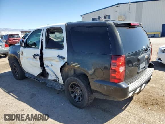 2011 Chevrolet Tahoe Commercial z VIN 1GNLC2E02BR224627, wystawiony jako Copart lot #50222855 z przebiegiem 167 553 mil mil oraz Szkoda całkowita • Salvage title. Historia ofert i sprzedaży dostępna na DreamBid. Obrazek 2.
