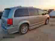 2014 Dodge Grand Caravan SXT with VIN 2C4RDGCG5ER477307, listed as a Copart auction lot 84047895 with 152,010 mi miles and Salvage title. Bid and sale history available at DreamBid. Image 3.