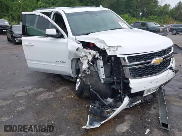 2020 Chevrolet Tahoe LT with VIN 1GNSCBKC5LR294926, listed as a IAAI auction lot 42189834 with 91,895 mi miles and . Bid and sale history available at DreamBid. Image 6.