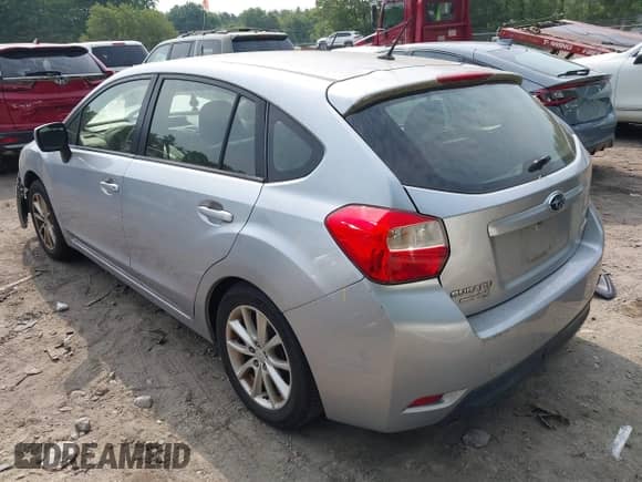 2013 Subaru Impreza Premium with VIN JF1GPAC63D1885557, listed as a IAAI auction lot 42445560 with 91,714 mi miles and . Bid and sale history available at DreamBid. Image 3.