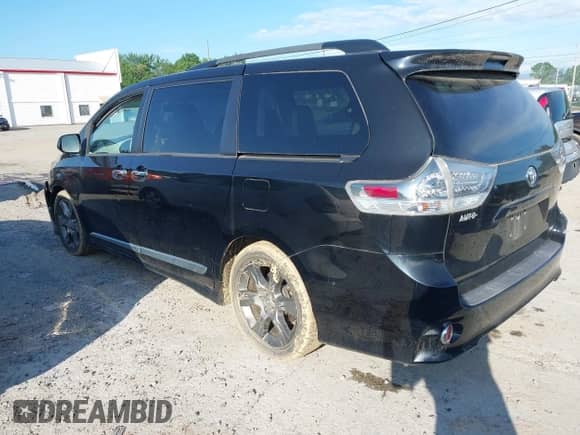 2014 Toyota Sienna SE with VIN 5TDXK3DC3ES494700, listed as a IAAI auction lot 42406747 with 73,410 mi miles and . Bid and sale history available at DreamBid. Image 3.
