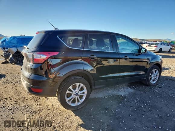 2017 Ford Escape SE с VIN 1FMCU9G99HUC81614, выставлен на аукционе Copart как лот 90099755 с пробегом 108 193 миль миль и Чистый • Clean title. История ставок и продаж доступна на DreamBid. Изображение 3.