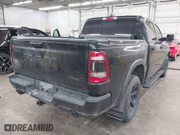 2020 Ram 1500 Rebel z VIN 1C6SRFLT7LN187484, wystawiony jako IAAI lot #42496264 z przebiegiem 80 426 mil mil oraz . Historia ofert i sprzedaży dostępna na DreamBid. Obrazek 4.