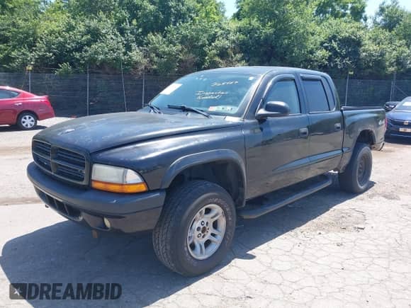 2003 Dodge Dakota Sport with VIN 1D7HG38NX3S368457, listed as a IAAI auction lot 42571380 with 159,798 mi miles and . Bid and sale history available at DreamBid. Image 18.