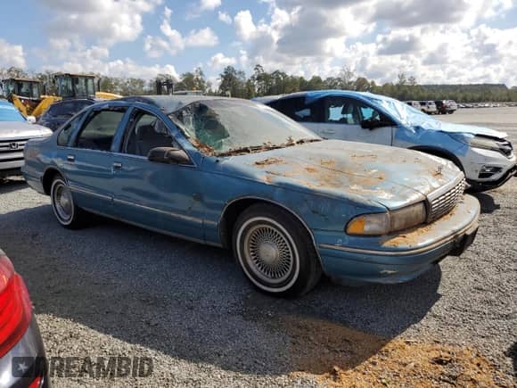 1996 Chevrolet Caprice 1SA Special Value с VIN 1G1BL52W0TR117388, выставлен на аукционе Copart как лот 74539074 с пробегом Не указан миль и Списание • Salvage title. История ставок и продаж доступна на DreamBid. Изображение 4.