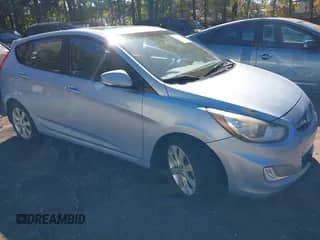 2013 Hyundai Accent SE with VIN KMHCU5AE0DU066759, listed as a IAAI auction lot 43486732 with 148,627 mi miles and . Bid and sale history available at DreamBid. Image 1.
