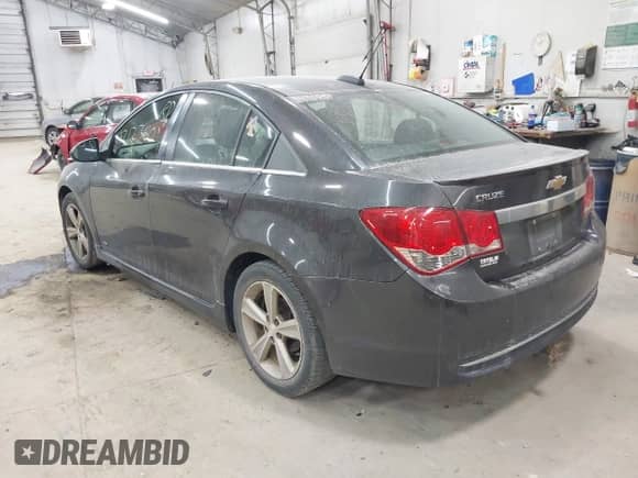 2015 Chevrolet Cruze LT with VIN 1G1PE5SB4F7112577, listed as a IAAI auction lot 43212360 with 210,905 mi miles and . Bid and sale history available at DreamBid. Image 3.