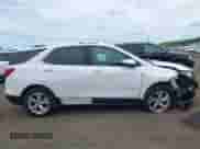 2021 Chevrolet Equinox Premier with VIN 3GNAXNEVXMS123151, listed as a IAAI auction lot 42775149 with 67,841 mi miles and . Bid and sale history available at DreamBid. Image 13.