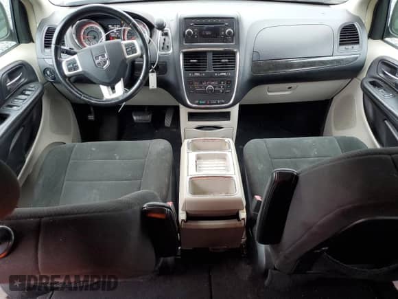 2012 Dodge Grand Caravan Crew z VIN 2C4RDGDGXCR109300, wystawiony jako Copart lot #66923345 z przebiegiem 174 973 mil mil oraz Szkoda całkowita • Salvage title. Historia ofert i sprzedaży dostępna na DreamBid. Obrazek 8.