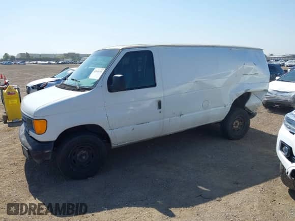2006 Ford Econoline Cargo with VIN 1FTRE14W56HA74084, listed as a IAAI auction lot 42538155 with 319,655 mi miles and . Bid and sale history available at DreamBid. Image 14.