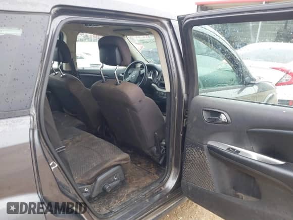 2014 Dodge Journey American Value with VIN 3C4PDCAB7ET247286, listed as a IAAI auction lot 41214056 with 205,222 mi miles and . Bid and sale history available at DreamBid. Image 8.