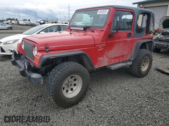 2001 Jeep Wrangler Sport with VIN 1J4FA49S11P339047, listed as a Copart auction lot 85923625 with 144,267 mi miles and Salvage title. Bid and sale history available at DreamBid. Image 1.