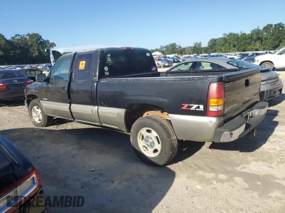 2000 Chevrolet Silverado 1500 LS with VIN 2GCEK19T3Y1355621, listed as a Copart auction lot 69316155 with 213,539 mi miles and Clean title. Bid and sale history available at DreamBid. Image 2.