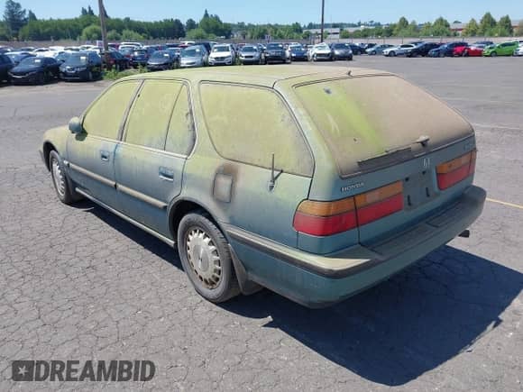 1991 Honda Accord with VIN 1HGCB9860MA012784, listed as a IAAI auction lot 42460041 with 243,569 mi miles and . Bid and sale history available at DreamBid. Image 3.