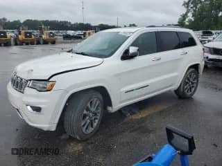 2017 Jeep Grand Cherokee Overland with VIN 1C4RJECG6HC628682, listed as a Copart auction lot 67950425 with 111,082 mi miles and Salvage title. Bid and sale history available at DreamBid. Image 1.