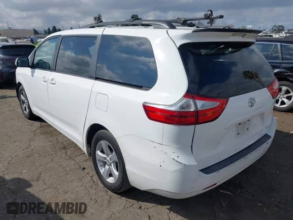 2015 Toyota Sienna LE with VIN 5TDKK3DC9FS574529, listed as a IAAI auction lot 43378279 with 169,347 mi miles and . Bid and sale history available at DreamBid. Image 3.