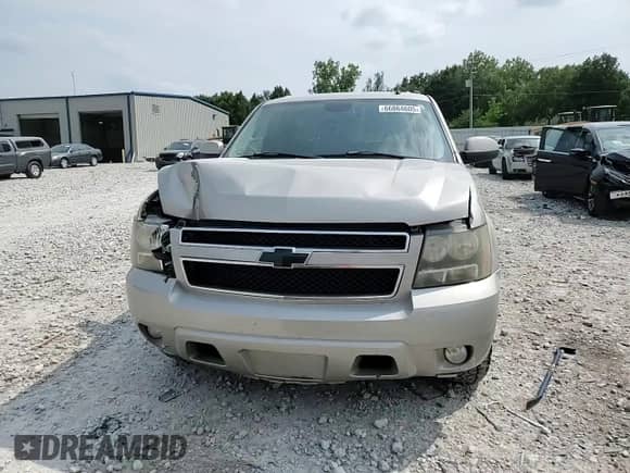 2007 Chevrolet Suburban LT z VIN 3GNFC16027G135928, wystawiony jako Copart lot #66864605 z przebiegiem 289 418 mil mil oraz Szkoda całkowita • Salvage title. Historia ofert i sprzedaży dostępna na DreamBid. Obrazek 14.