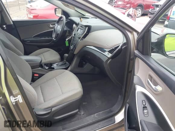 2015 Hyundai Santa Fe with VIN 5XYZTDLB6FG258772, listed as a IAAI auction lot 42634477 with 118,500 mi miles and . Bid and sale history available at DreamBid. Image 5.