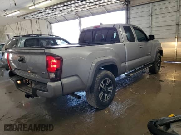 2018 Toyota Tacoma SR5 with VIN 5TFRZ5CN5JX066473, listed as a Copart auction lot 50875405 with 55,391 mi miles and Salvage title. Bid and sale history available at DreamBid. Image 3.
