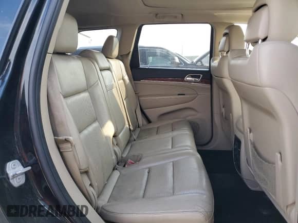 2013 Jeep Grand Cherokee Limited z VIN 1C4RJFBG7DC648943, wystawiony jako Copart lot #85731515 z przebiegiem 200 146 mil mil oraz Szkoda całkowita • Salvage title. Historia ofert i sprzedaży dostępna na DreamBid. Obrazek 11.