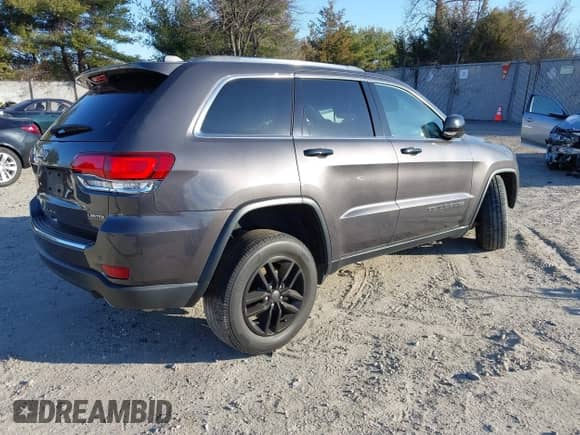 2021 Jeep Grand Cherokee 80th Anniversary with VIN 1C4RJFBG5MC737412, listed as a IAAI auction lot 41753550 with 54,921 mi miles and . Bid and sale history available at DreamBid. Image 4.