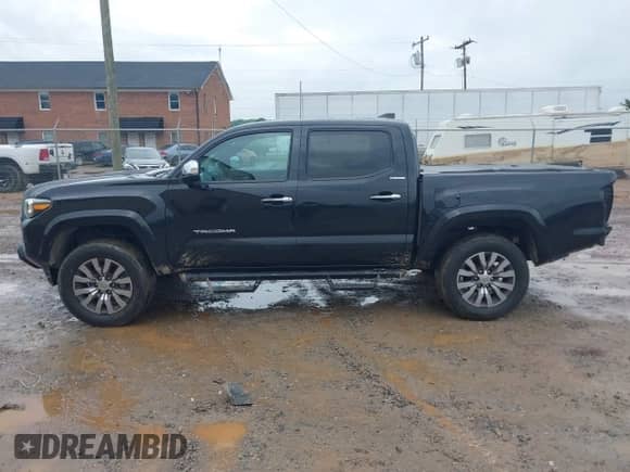 2021 Toyota Tacoma Limited with VIN 3TYGZ5AN0MT017514, listed as a IAAI auction lot 42244228 with 107,563 mi miles and . Bid and sale history available at DreamBid. Image 15.