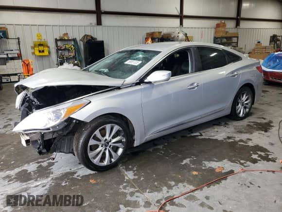 2014 Hyundai Azera с VIN KMHFG4JG0EA355997, выставлен на аукционе Copart как лот 59851335 с пробегом Не указан миль и Списание • Salvage title. История ставок и продаж доступна на DreamBid. Изображение 1.