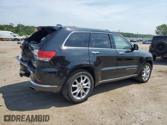 2014 Jeep Grand Cherokee Summit with VIN 1C4RJFJT4EC508994, listed as a Copart auction lot 66526655 with 107,657 mi miles and Salvage title. Bid and sale history available at DreamBid. Image 3.