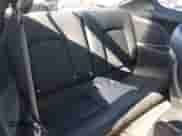 2003 Hyundai Tiburon GT z VIN KMHHN65F73U101856, wystawiony jako Copart lot #64248815 z przebiegiem 59 622 mil mil oraz Szkoda całkowita • Salvage title. Historia ofert i sprzedaży dostępna na DreamBid. Obrazek 10.