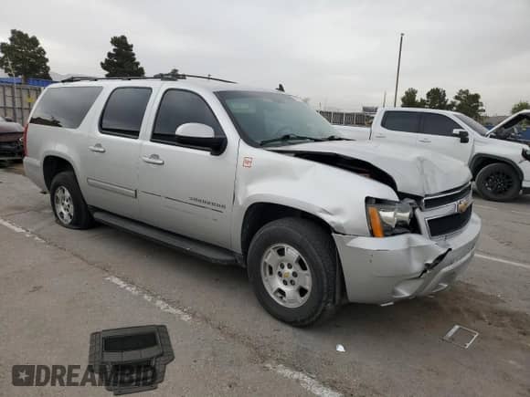 2011 Chevrolet Suburban LS с VIN 1GNSCHE07BR353381, выставлен на аукционе Copart как лот 50473775 с пробегом 188 663 миль миль и Списание • Salvage title. История ставок и продаж доступна на DreamBid. Изображение 4.