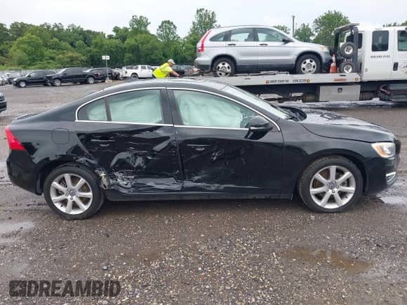 2016 Volvo S60 T5 Drive-E Premier z VIN YV126MFK7G2407961, wystawiony jako IAAI lot #42640958 z przebiegiem 96 884 mil mil oraz . Historia ofert i sprzedaży dostępna na DreamBid. Obrazek 13.