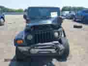 2006 Jeep Wrangler Sport z VIN 1J4FA49S16P784119, wystawiony jako IAAI lot #42470790 z przebiegiem Nie podano mil oraz . Historia ofert i sprzedaży dostępna na DreamBid. Obrazek 11.