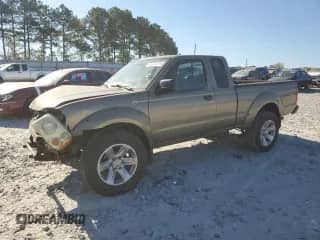 2002 Nissan Frontier XE with VIN 1N6ED26T82C373227, listed as a Copart auction lot 77777714 with 262,597 mi miles and Salvage title. Bid and sale history available at DreamBid. Image 1.