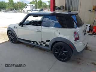 2007 MINI Hardtop with VIN WMWMF33557TL67653, listed as a IAAI auction lot 42581219 with 147,115 mi miles and . Bid and sale history available at DreamBid. Image 3.
