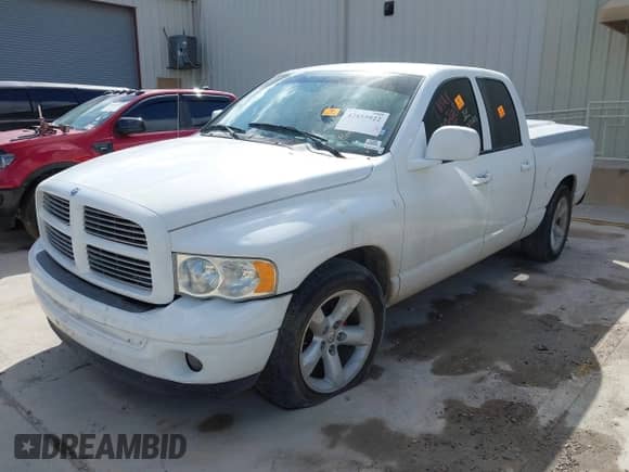 2004 Dodge 1500 SLT with VIN 1D7HA18DX4J100268, listed as a IAAI auction lot 42855922 with 199,039 mi miles and . Bid and sale history available at DreamBid. Image 2.